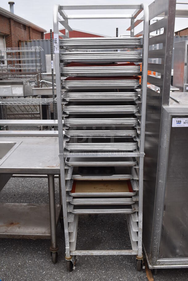 Metal Commercial Pan Transport Rack w/ 82 Metal Half Size Baking Pans on Commercial Caster. 20.5x26x68