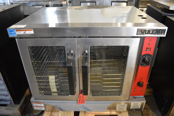 BRAND NEW SCRATCH AND DENT! Vulcan VC4ED Stainless Steel Commercial Electric Powered Single Deck Full Size Electric Convection Oven. 208 Volts, 1/3 Phase. 40.5x42x32. Tested and Working!
