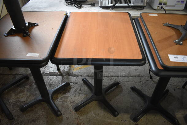 2 Wood Pattern Dining Height Table on Black Metal Table Base. Stock Picture - Cosmetic Condition May Vary. 20x24x30. 2 Times Your Bid! - Image 1 of 4
