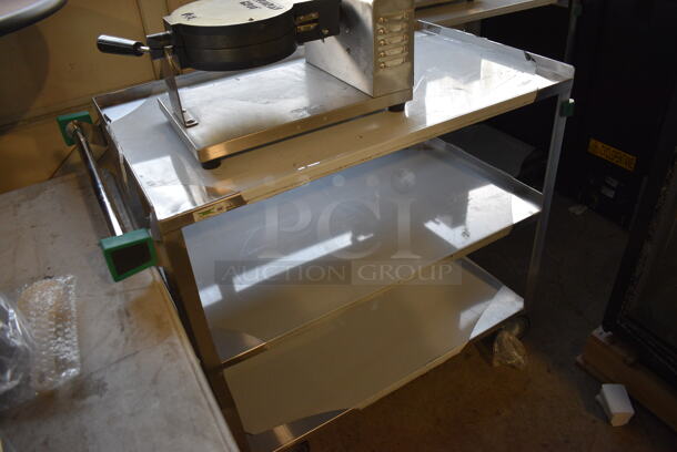 BRAND NEW SCRATCH AND DENT! Regency Stainless Steel Commercial Three Tier 18 Gauge 430 Stainless Steel Utility Cart on Commercial Casters. 22x38.5x34
 - Image 2 of 4