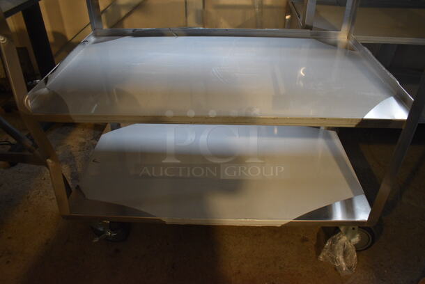 BRAND NEW SCRATCH AND DENT! Regency Stainless Steel Commercial Three Tier 18 Gauge 430 Stainless Steel Utility Cart on Commercial Casters. 22x38.5x34
 - Image 3 of 4