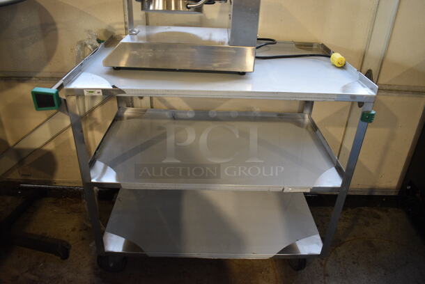 BRAND NEW SCRATCH AND DENT! Regency Stainless Steel Commercial Three Tier 18 Gauge 430 Stainless Steel Utility Cart on Commercial Casters. 22x38.5x34
