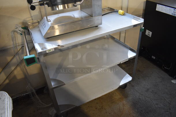 BRAND NEW SCRATCH AND DENT! Regency Stainless Steel Commercial Three Tier 18 Gauge 430 Stainless Steel Utility Cart on Commercial Casters. 22x38.5x34
 - Image 3 of 5