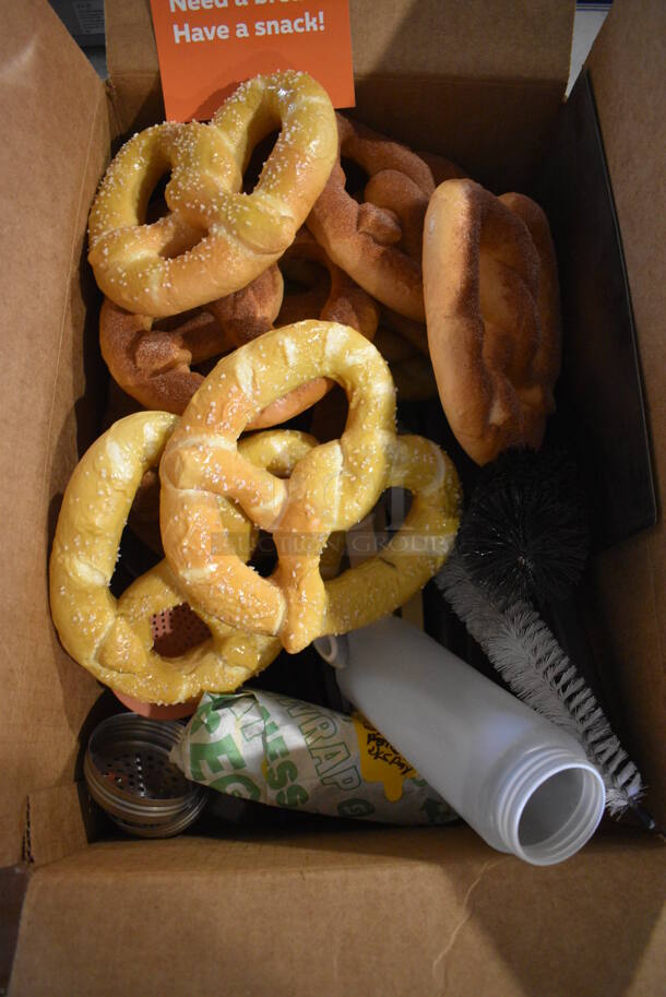 ALL ONE MONEY! Tabletop Lot of Various Items Including Stainless Steel Drop In Bins, Poly Condiment Bottles and Fake Display Pretzels - Image 6 of 8