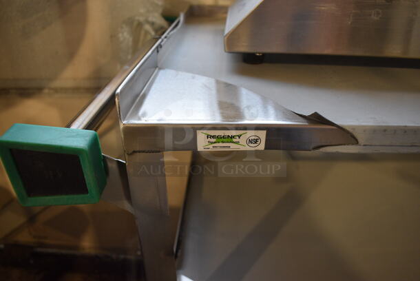 BRAND NEW SCRATCH AND DENT! Regency Stainless Steel Commercial Three Tier 18 Gauge 430 Stainless Steel Utility Cart on Commercial Casters. 22x38.5x34
 - Image 4 of 5