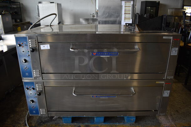 2 Bakers Pride ER-12-5736 Stainless Steel Commercial Electric Powered Single Deck Pizza Oven w/ Cooking Stones. Comes w/ 4 Legs. 208 Volts, 3 Phase. 74x46x50. 2 Times Your Bid!