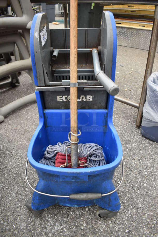 Ecolab Blue Poly Mop Bucket w/ Wringing Attachment and Mop on Commercial Casters. 16x19x32