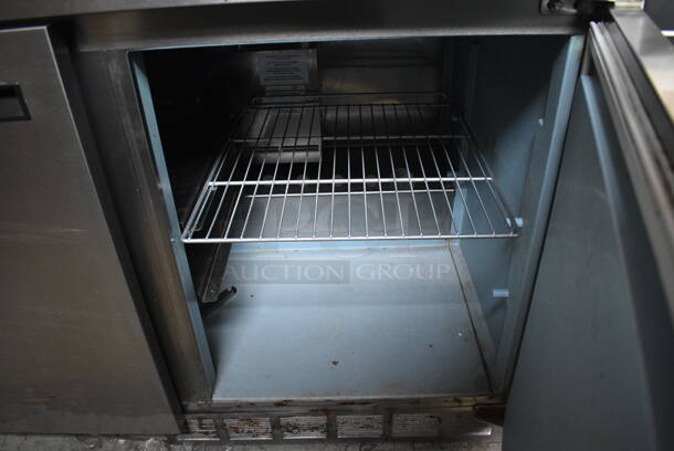Delfield 4448N-12-A831 Stainless Steel Commercial Sandwich Salad Prep Table Bain Marie Mega Top on Commercial Casters. 115 Volts, 1 Phase. 48x32.5x40.5. Tested and Powers On But Temps at 44 Degrees - Image 6 of 8