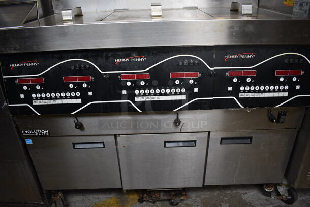 2016 Henny Penny EEG-243 FFFX ST Evolution Elite ENERGY STAR Stainless Steel Commercial Natural Gas Powered 3 Bay Deep Fat Fryer w/ 3 Lids on Commercial Casters. 225,000 BTU. 47x32x46.5 - Image 2 of 11