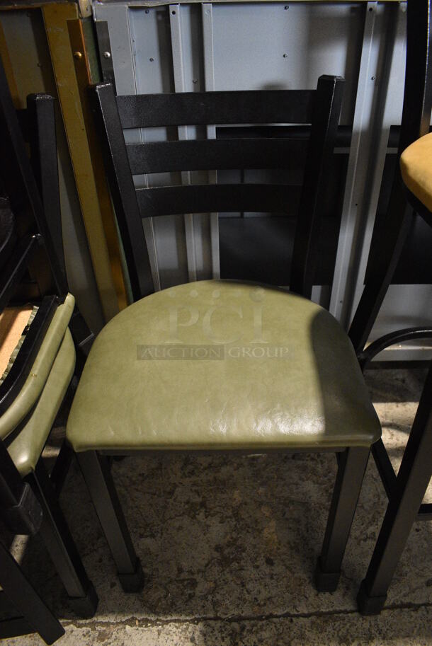 2 Black Metal Dining Height Chairs w/ Green Seat Cushions. Stock Picture - Cosmetic Condition May Vary. 16x16x32. 2 Times Your Bid!