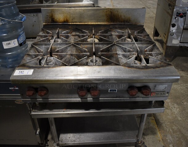 Wolf Stainless Steel Commercial Countertop Natural Gas Powered 6 Burner Range on Stainless Steel Equipment Stand w/ Under Shelf and Commercial Casters. 36x41x19.5