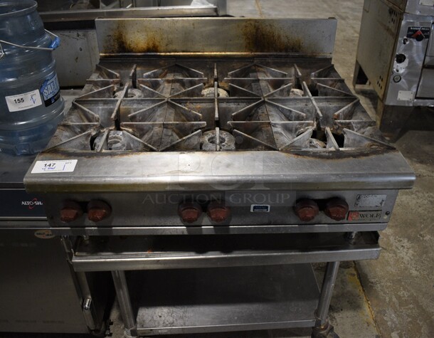 Wolf Stainless Steel Commercial Countertop Natural Gas Powered 6 Burner Range on Stainless Steel Equipment Stand w/ Under Shelf and Commercial Casters. 36x41x19.5 - Image 1 of 7