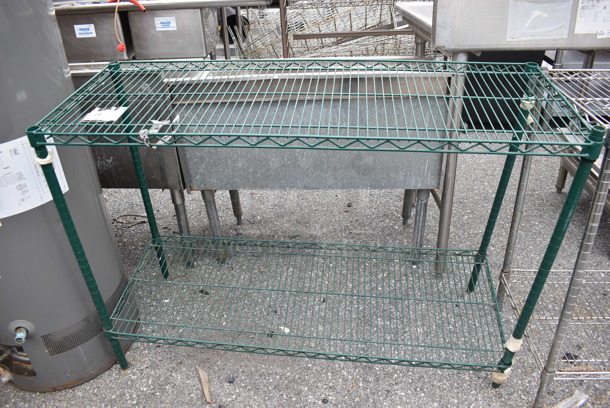Green Finish 2 Tier Wire Shelving Unit. BUYER MUST DISMANTLE. PCI CANNOT DISMANTLE FOR SHIPPING. PLEASE CONSIDER FREIGHT CHARGES. 48x18x35