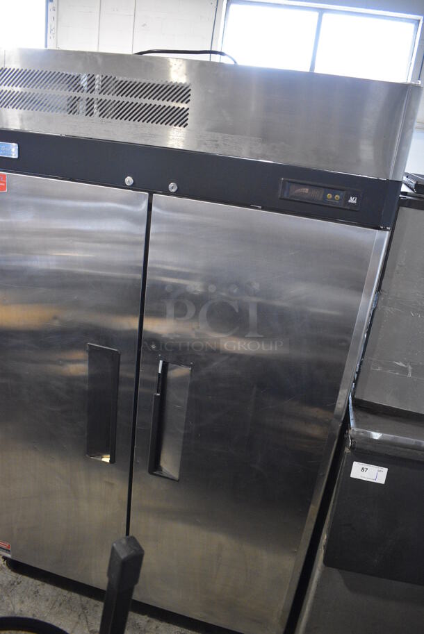 Turbo Air M3R47-2 Stainless Steel Commercial 2 Door Reach In Cooler w/ Poly Coated Racks on Commercial Casters. 115 Volts, 1 Phase. 52x30x83. Tested and Working! - Image 3 of 6