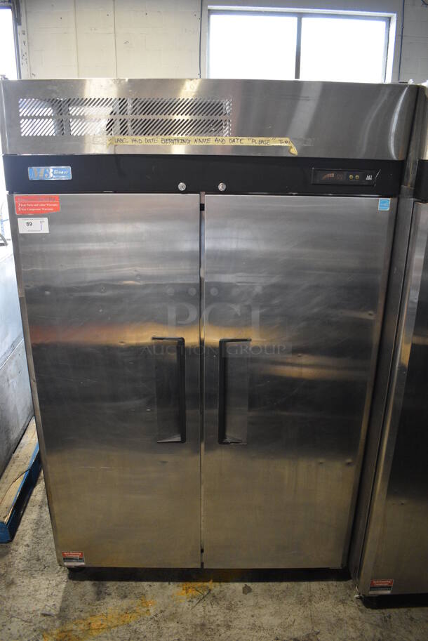 Turbo Air M3R47-2 Stainless Steel Commercial 2 Door Reach In Cooler w/ Poly Coated Racks on Commercial Casters. 115 Volts, 1 Phase. 52x30x83. Tested and Powers On But Temps at 41 Degrees