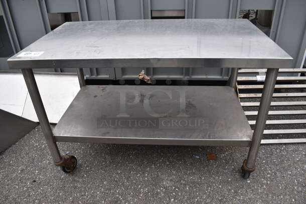 Stainless Steel Commercial Table w/ Under Shelf on Commercial Casters. 42x24x27.5