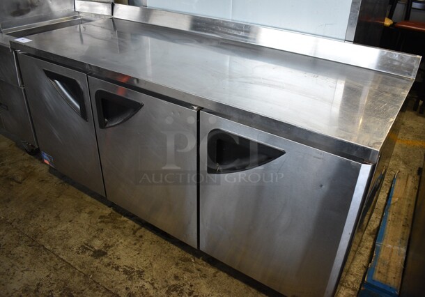 Turbo Air TWR-72SD Stainless Steel Commercial 3 Door Work Top Cooler on Commercial Casters. 115 Volts, 1 Phase. 62.5x30x39. Cannot Test Due To Cut Power Cord