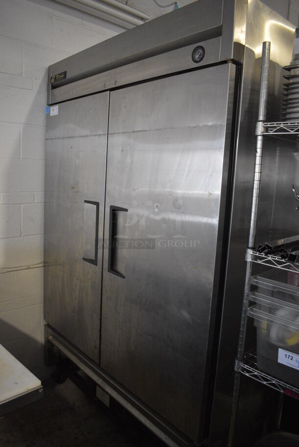 2016 True T-49F ENERGY STAR Stainless Steel Commercial 2 Door Reach In Freezer w/ Poly Coated Racks on Commercial Casters. 115 Volts, 1 Phase. 54x30x83. Tested and Working!