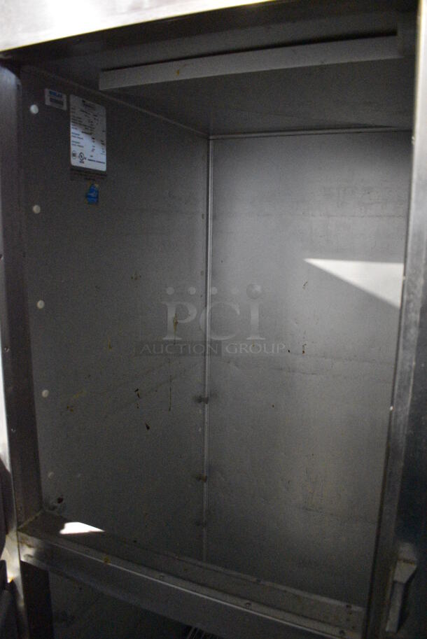Traulsen G200000 ENERGY STAR Stainless Steel Commercial 4 Half Size Door Reach In Cooler on Commercial Casters. 115 Volts, 1 Phase. 52x36x83. Tested and Powers On But Temps at 45 Degrees - Image 4 of 8