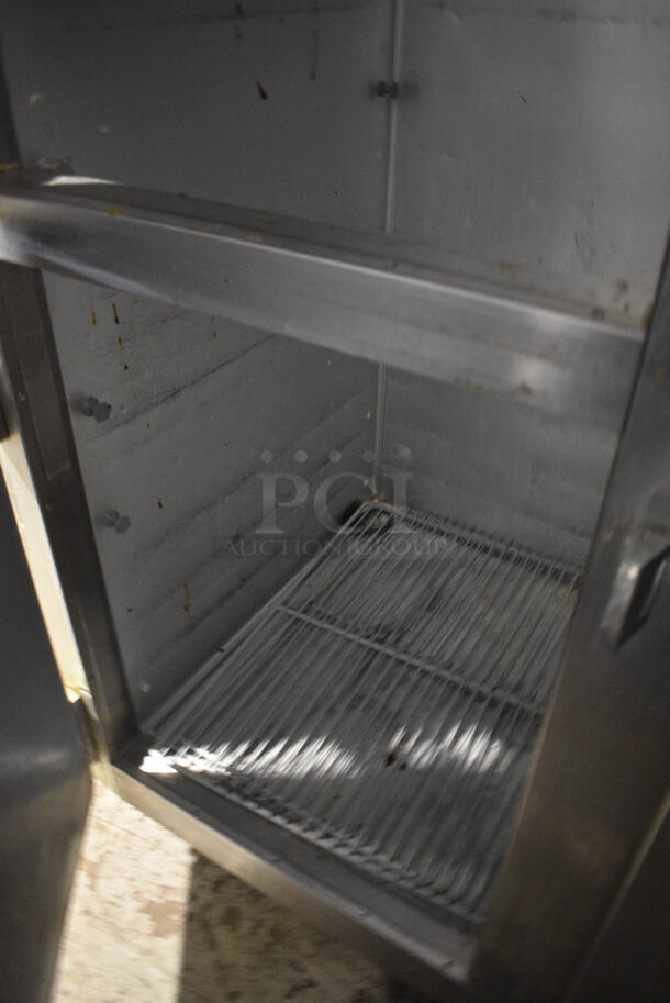Traulsen G200000 ENERGY STAR Stainless Steel Commercial 4 Half Size Door Reach In Cooler on Commercial Casters. 115 Volts, 1 Phase. 52x36x83. Tested and Powers On But Temps at 45 Degrees - Image 5 of 8