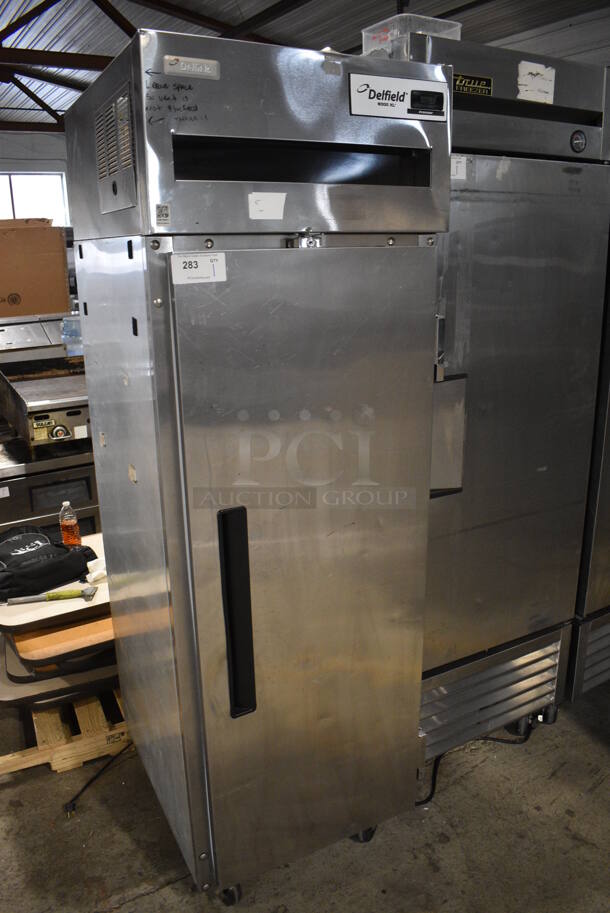 2010 Delfield 6125XL-S-STAR1 ENERGY STAR Stainless Steel Commercial Single Door Reach In Freezer w/ Metal Racks on Commercial Casters. 115 Volts, 1 Phase. 25.5x33.5x79.5. Tested and Working! - Image 2 of 6