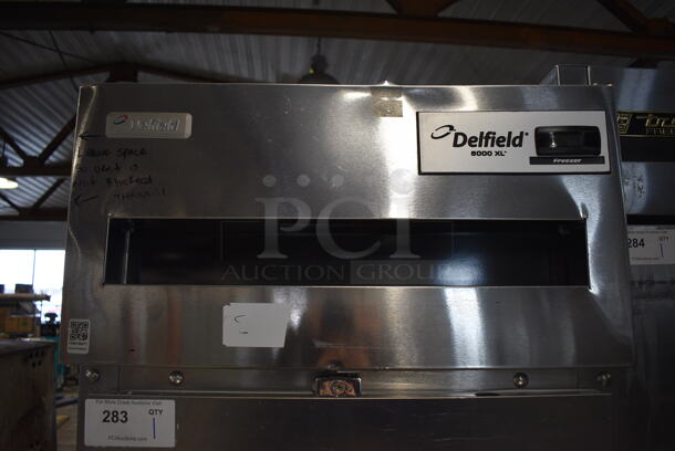 2010 Delfield 6125XL-S-STAR1 ENERGY STAR Stainless Steel Commercial Single Door Reach In Freezer w/ Metal Racks on Commercial Casters. 115 Volts, 1 Phase. 25.5x33.5x79.5. Tested and Working! - Image 4 of 6