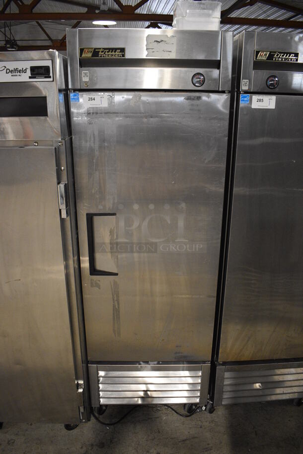 2013 True T-23F ENERGY STAR Stainless Steel Commercial Single Door Reach In Freezer w/ Poly Coated Racks on Commercial Casters. 115 Volts, 1 Phase. 27x30x83. Tested and Working! - Image 1 of 5