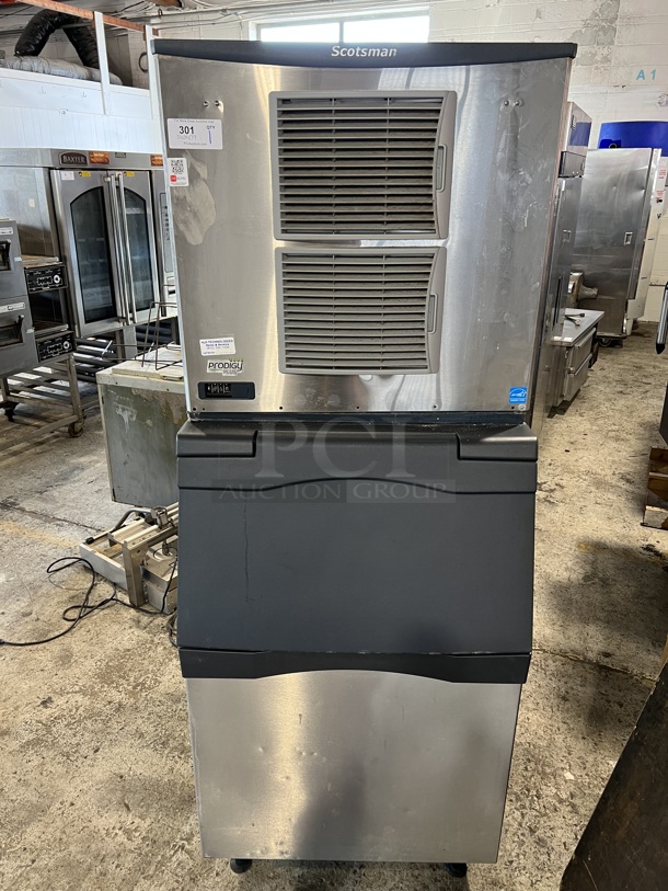 Scotsman C0830SA-32D Stainless Steel Commercial Ice Machine Head on Scotsman B530S Stainless Steel Commercial Ice Machine Bin. 208/230 Volts, 1 Phase. 31x34x79