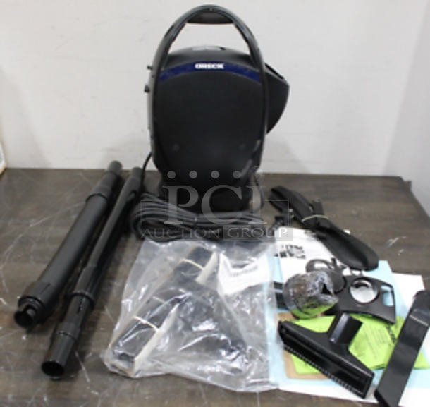 BRAND NEW! Oreck CC1600 Ultimate Handheld Bagged Canister Vacuum. Stock Picture Used For Gallery Picture. 120 Volts, 1 Phase. 14x10x16. Tested and Working!