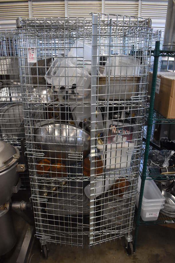 Chrome Finish 4 Tier Wire Shelving Unit w/ Liquor Cage and Contents on Commercial Casters. BUYER MUST DISMANTLE. PCI CANNOT DISMANTLE FOR SHIPPING. PLEASE CONSIDER FREIGHT CHARGES. 30x20x70