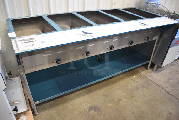 BRAND NEW! ServIt EST-5WE Stainless Steel Commercial Floor Style Electric Powered 5 Bay Steam Table with Undershelf and Cutting Board. 72x30x34. Tested and Working!