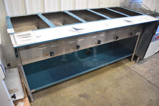 BRAND NEW! ServIt EST-5WE Stainless Steel Commercial Floor Style Electric Powered 5 Bay Steam Table with Undershelf and Cutting Board. 72x30x34. Tested and Working! - Image 1 of 10