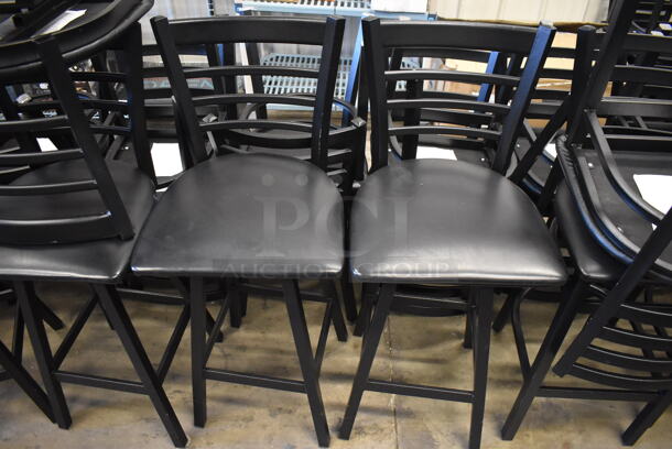 6 Black Metal Bar Height Swivel Chairs w/ Black Seat Cushion and Horizontal Back Rest Bars. Stock Picture - Cosmetic Condition May Vary. 17x18x43.5. 6 Times Your Bid!