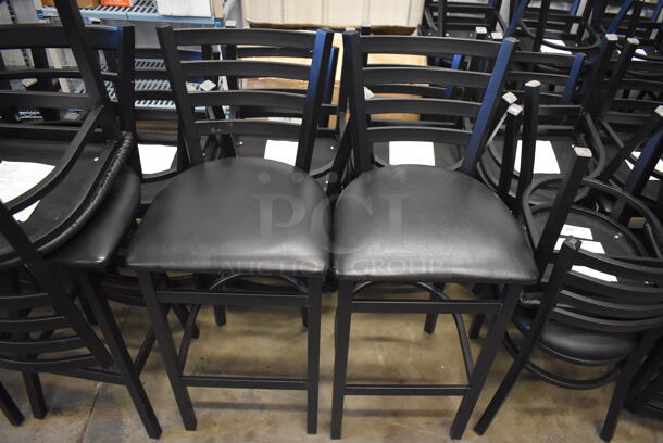 4 Black Metal Bar Height Chairs w/ Black Seat Cushion and Horizontal Back Rest Bars. 17x17x43. 4 Times Your Bid!