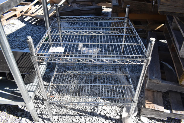 Chrome Finish 2 Tier Wire Shelving Unit. BUYER MUST DISMANTLE. PCI CANNOT DISMANTLE FOR SHIPPING. PLEASE CONSIDER FREIGHT CHARGES. 24x24x28 - Image 1 of 4
