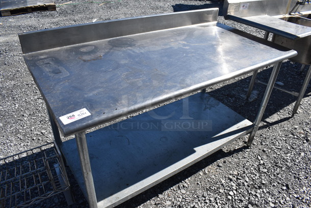 Stainless Steel Table w/ Back Splash and Under Shelf. 60x30x40 - Image 1 of 4