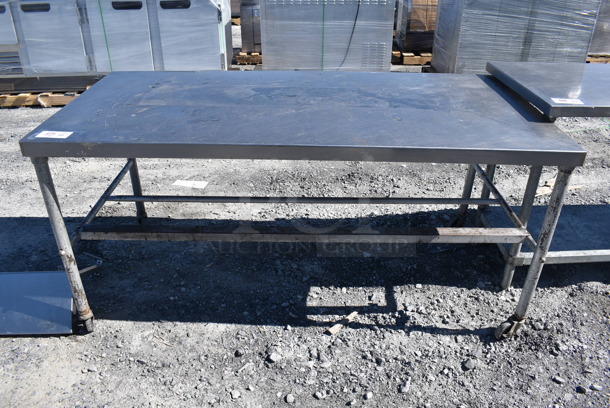 Stainless Steel Table on Commercial Casters. 68x32x33