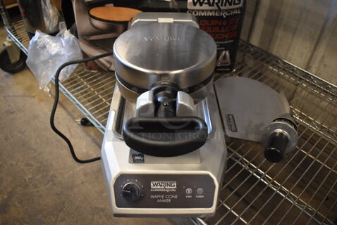 BRAND NEW! Waring WWCM180 Stainless Steel Commercial Countertop Waffle Cone Press w/ Waffle Cone Former. 120 Volts, 1 Phase. 9x17x10. Tested and Working!