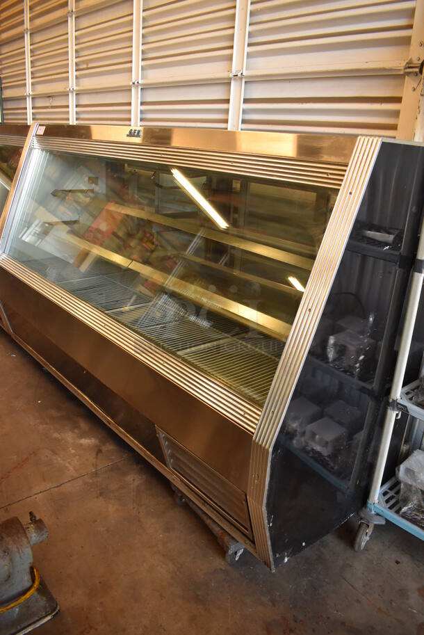 GEM Metal Commercial Floor Style Deli Display Case Merchandiser. 96x34x61. Tested and Powers On But Does Not Get Cold
