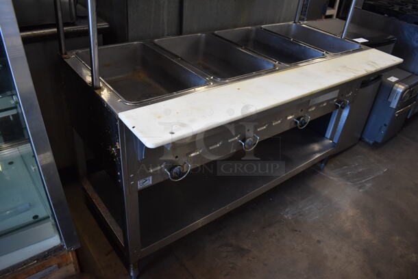 Duke Stainless Steel Commercial 4 Well Steam Table w/ 2 Over Shelves, Warming Strip, Cutting Board and Under Shelf. 58x31x74. Cannot Test Due To Missing Power Cord - Image 3 of 9