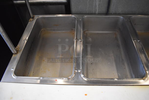 Duke Stainless Steel Commercial 4 Well Steam Table w/ 2 Over Shelves, Warming Strip, Cutting Board and Under Shelf. 58x31x74. Cannot Test Due To Missing Power Cord - Image 4 of 9