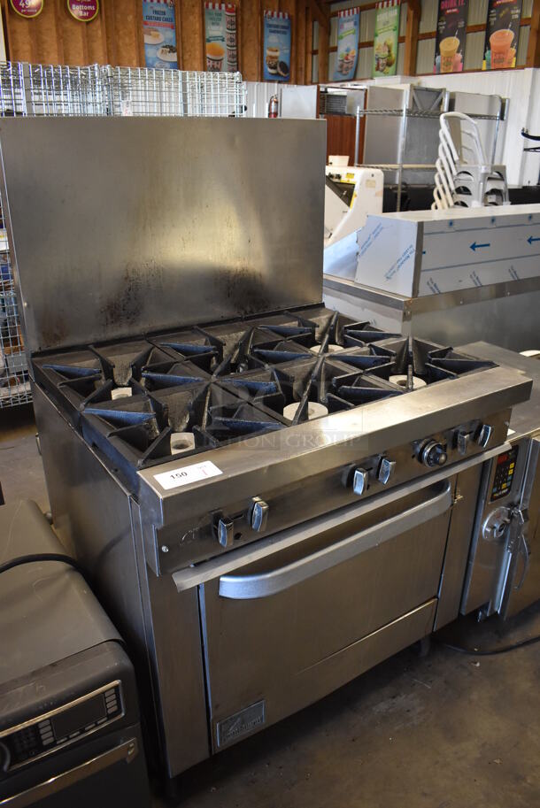 Southbend Stainless Steel Commercial Natural Gas Powered 6 Burner Range w/ Oven and Back Splash on Commercial Casters. 36x34x60