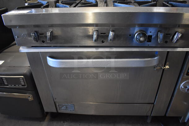 Southbend Stainless Steel Commercial Natural Gas Powered 6 Burner Range w/ Oven and Back Splash on Commercial Casters. 36x34x60 - Image 4 of 6