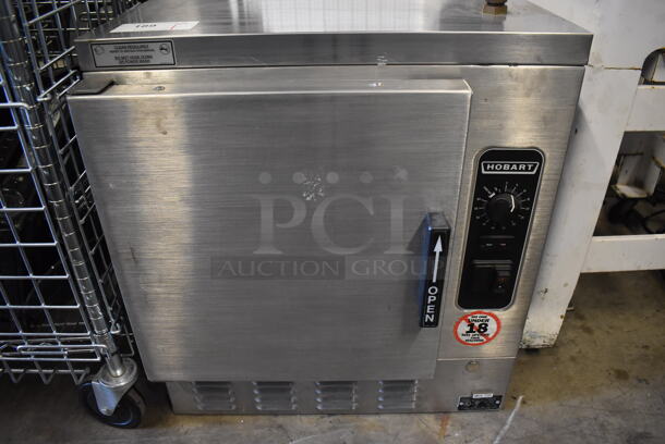Hobart HC24EA5 Stainless Steel Commercial Electric Powered Single Compartment Steam Cabinet. 208/240 Volts, 3/1 Phase. 24x32x26