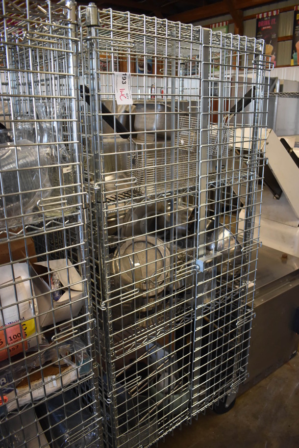 Chrome Finish 4 Tier Wire Shelving Unit w/ Liquor Cage and Contents on Commercial Casters. BUYER MUST DISMANTLE. PCI CANNOT DISMANTLE FOR SHIPPING. PLEASE CONSIDER FREIGHT CHARGES. 30x20x70