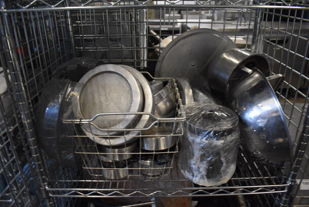 Chrome Finish 4 Tier Wire Shelving Unit w/ Liquor Cage and Contents on Commercial Casters. BUYER MUST DISMANTLE. PCI CANNOT DISMANTLE FOR SHIPPING. PLEASE CONSIDER FREIGHT CHARGES. 30x20x70 - Image 4 of 6