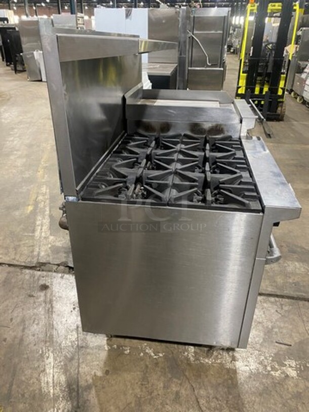 BEAUTIFUL! Garland Commercial Natural Gas Powered 6 Burner Stove With Right Side Flat Griddle! Griddle Has Side Splashes! With Raised Back Splash And Salamander Shelf! With 2 Oven Underneath! ONE OVEN WITH CONVECTION! Metal Oven Racks! All Stainless Steel! On Legs! - Image 4 of 12