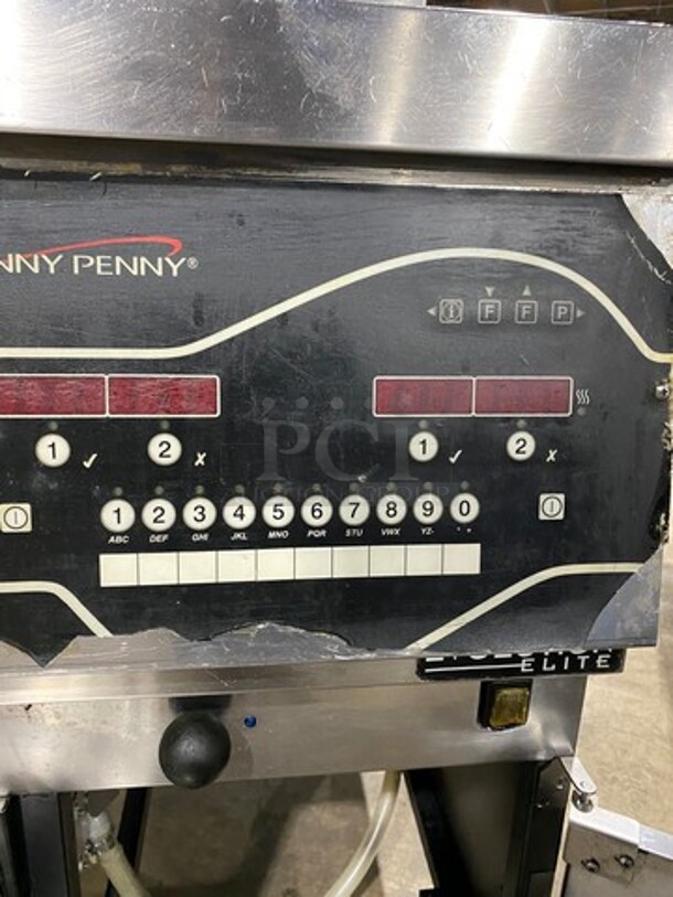 Henny Penny Commercial Natural Gas Powered 2 Bay Fryer! All Stainless Steel On Casters! Model: EEG142FFXX SN: BW1304009 - Image 9 of 12