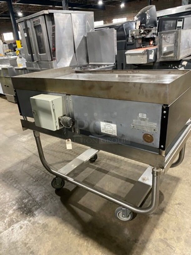 WOW! NEW! NEVER USED! Garland Commercial Countertop Electric Powered Flat Top Griddle! With Back And Side Splashes! On Legs! On Equipment Stand! All Stainless Steel! On Casters! Model: E2448G SN: 0404ME0033 208V 60HZ 3 Phase - Image 4 of 10