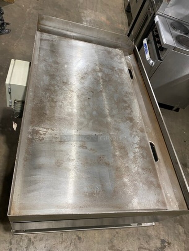WOW! NEW! NEVER USED! Garland Commercial Countertop Electric Powered Flat Top Griddle! With Back And Side Splashes! On Legs! On Equipment Stand! All Stainless Steel! On Casters! Model: E2448G SN: 0404ME0033 208V 60HZ 3 Phase - Image 5 of 10
